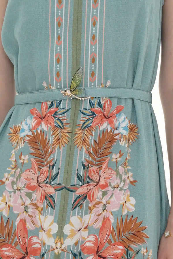 Close-up of Pretty Pixie dusty teal flutter-sleeve belted midi dress, fabric detail