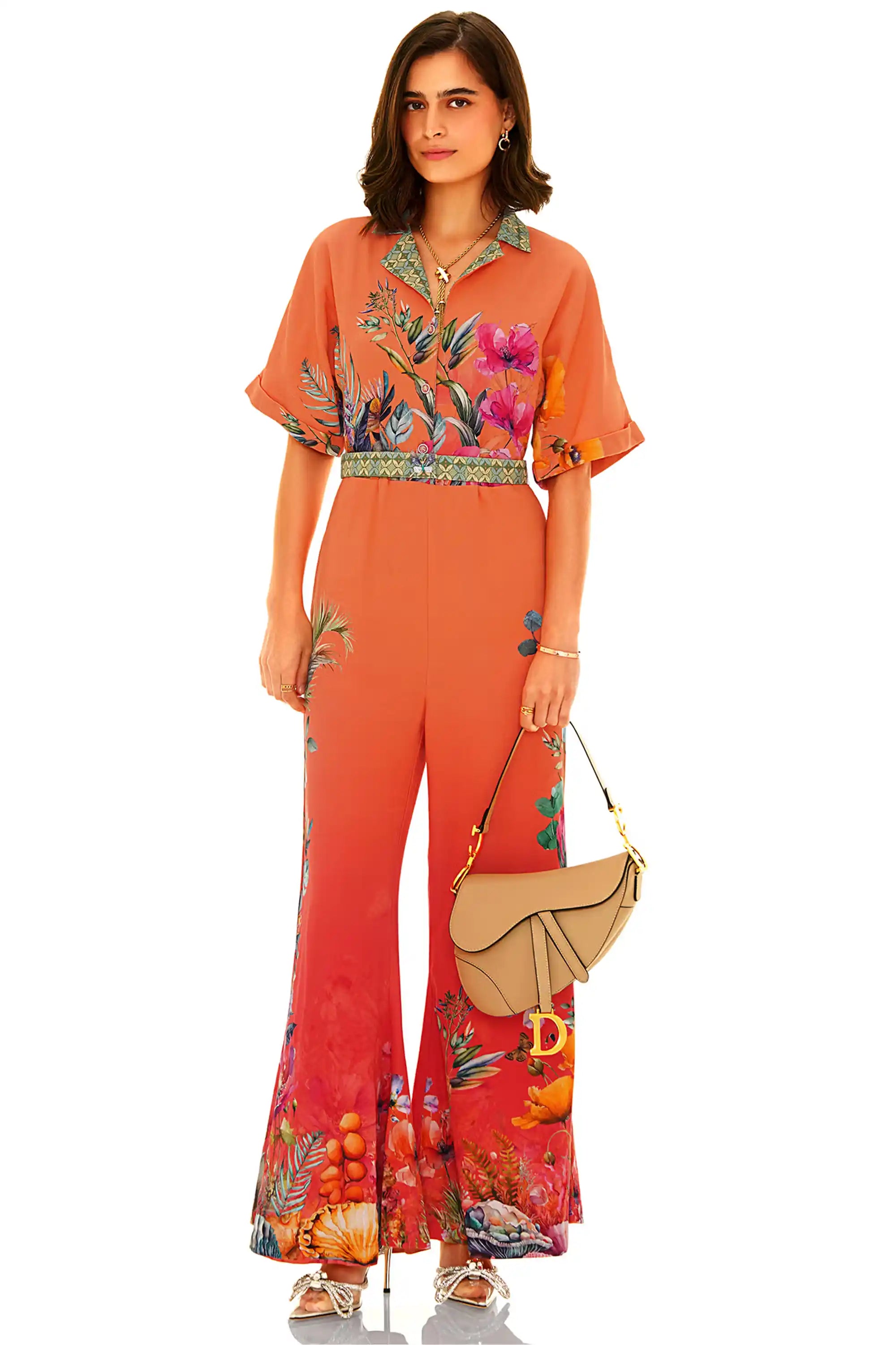 Front view of orange floral wide-leg jumpsuit with collared neckline