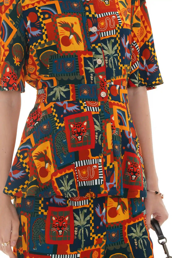 Close-up of Pretty Pixie tropical patchwork peplum co-ord set