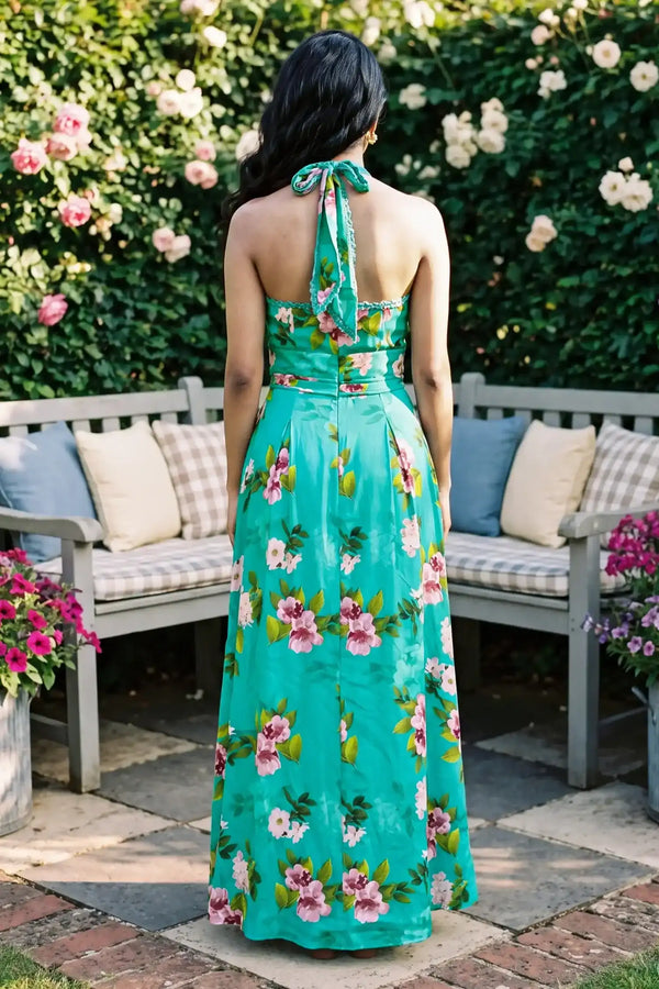 Full-length back view of turquoise floral halter maxi dress; organic cotton women's evening and occasion wear for women