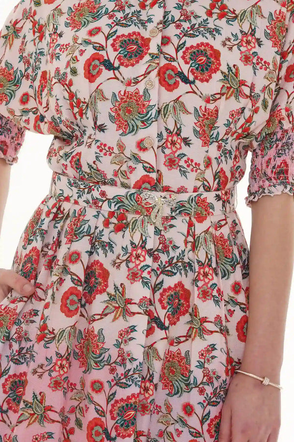 Close-up of Pretty Pixie turquoise floral lace-hem V-neck puff-sleeve mini dress