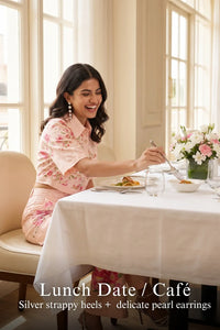 Woman in Pretty Pixie brooklyn blush pink cropped shirt & flare pants co-ord set styled for a styled look