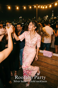 Woman in Pretty Pixie brooklyn blush pink cropped shirt & flare pants co-ord set styled for a styled look