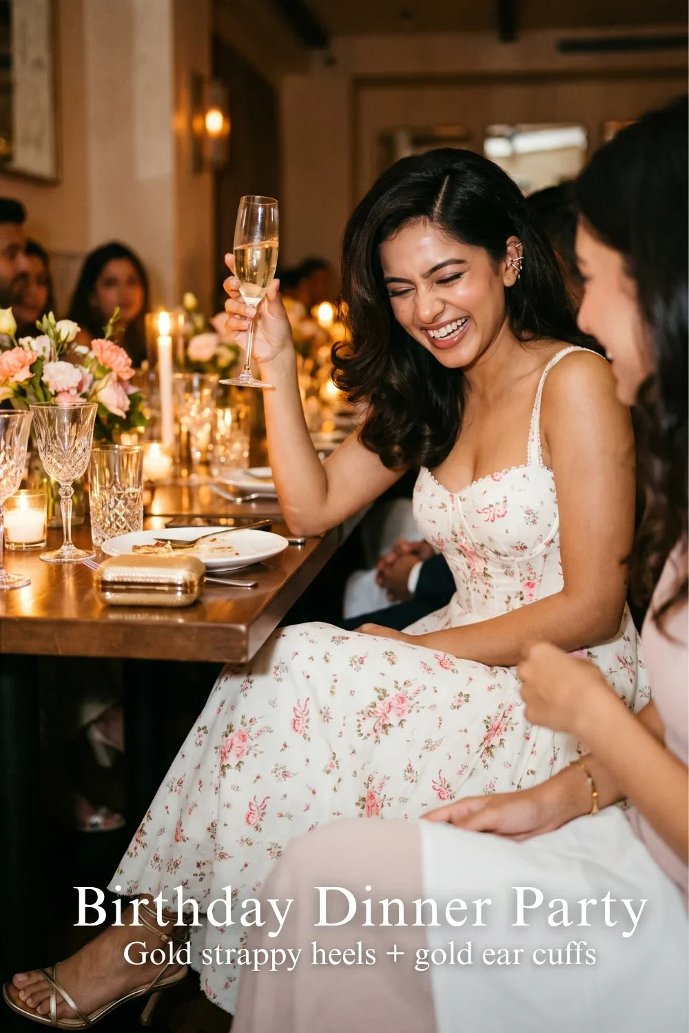 Woman in Pretty Pixie ivory floral bustier midi dress styled for a styled look