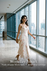Woman in Pretty Pixie ivory floral bustier midi dress styled for a styled look