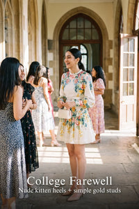 Woman in Pretty Pixie ivory floral ruffle-neck puff-sleeve mini dress styled for a styled look
