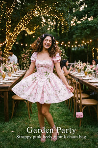 Woman in Pretty Pixie pink puff-sleeve floral mini dress styled for a styled look