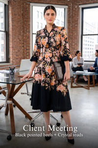 Woman in Pretty Pixie rosalia bloom black floral belted midi dress styled for a styled look