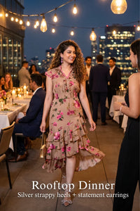 Woman in Pretty Pixie taupe pink floral ruffle midi dress styled for a styled look