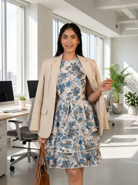 Blue floral dress travel look: beige blazer brown bag office styling professional casual women