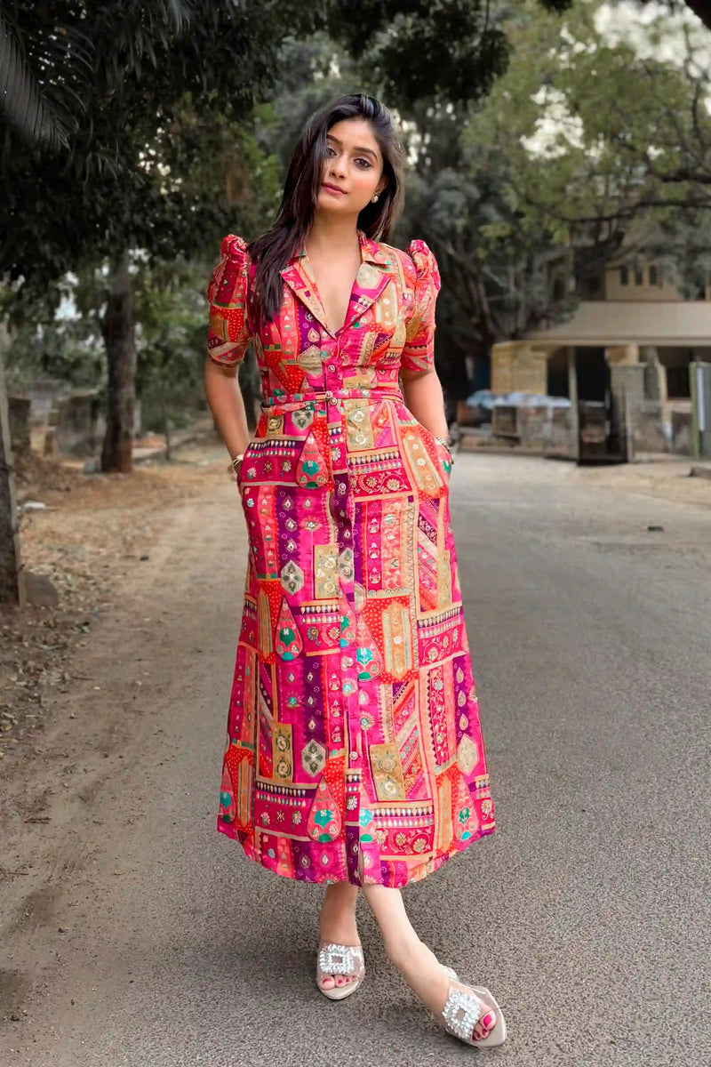 Akshata Deshpande wearing the Royal Magenta silk floral belted midi dress by Pretty Pixie, styled outdoors.