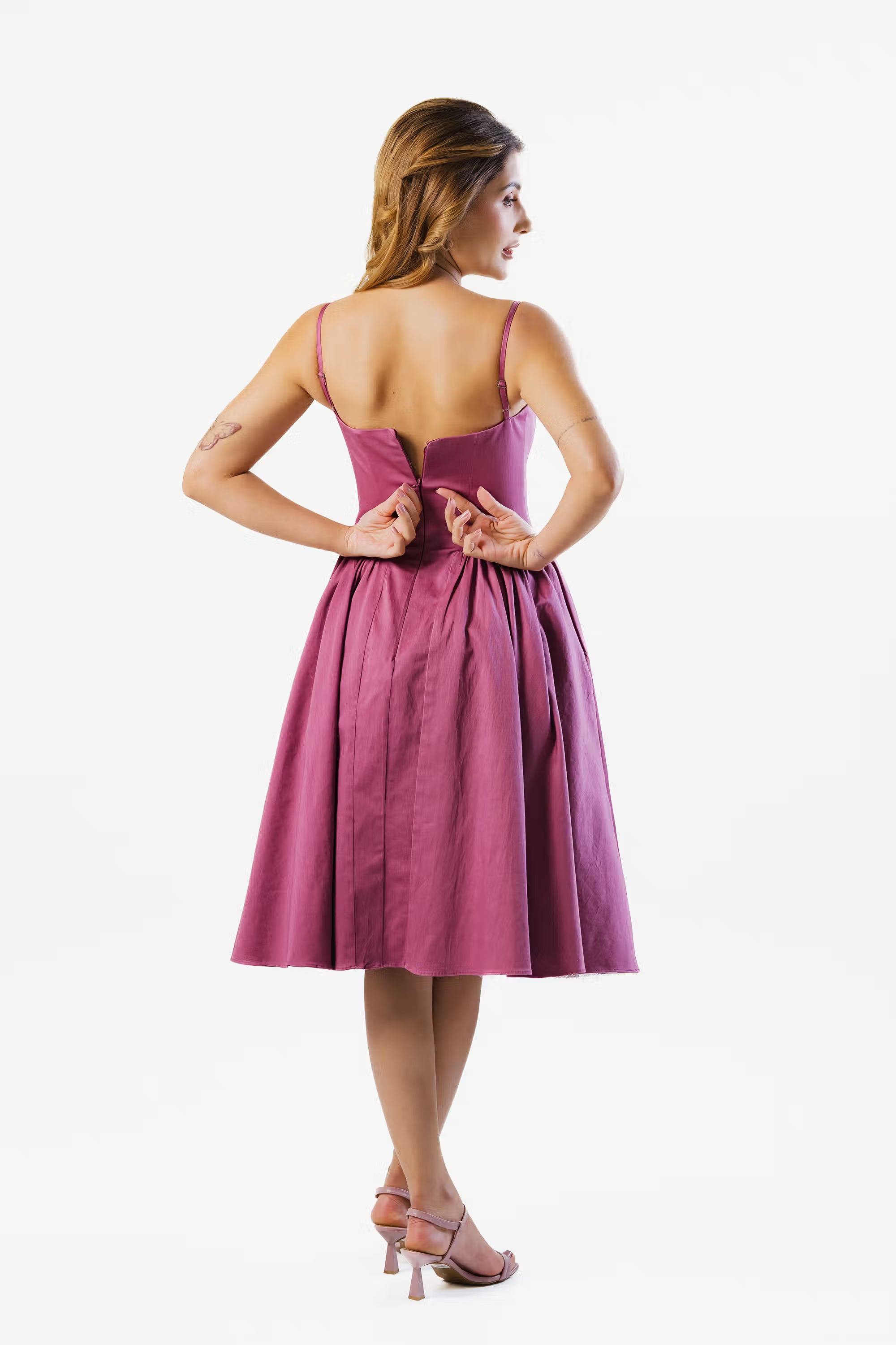 Plum midi dress with back zipper closure, modern and classy style for special occasions.