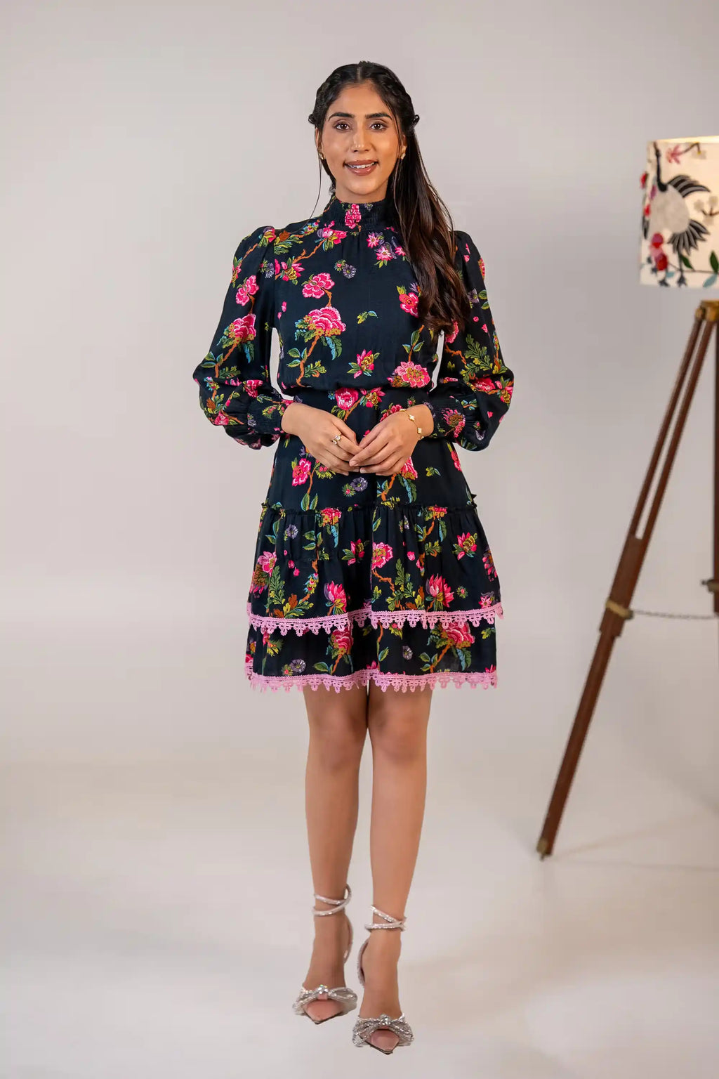 Black floral lace-trim mini dress with long sleeves front view