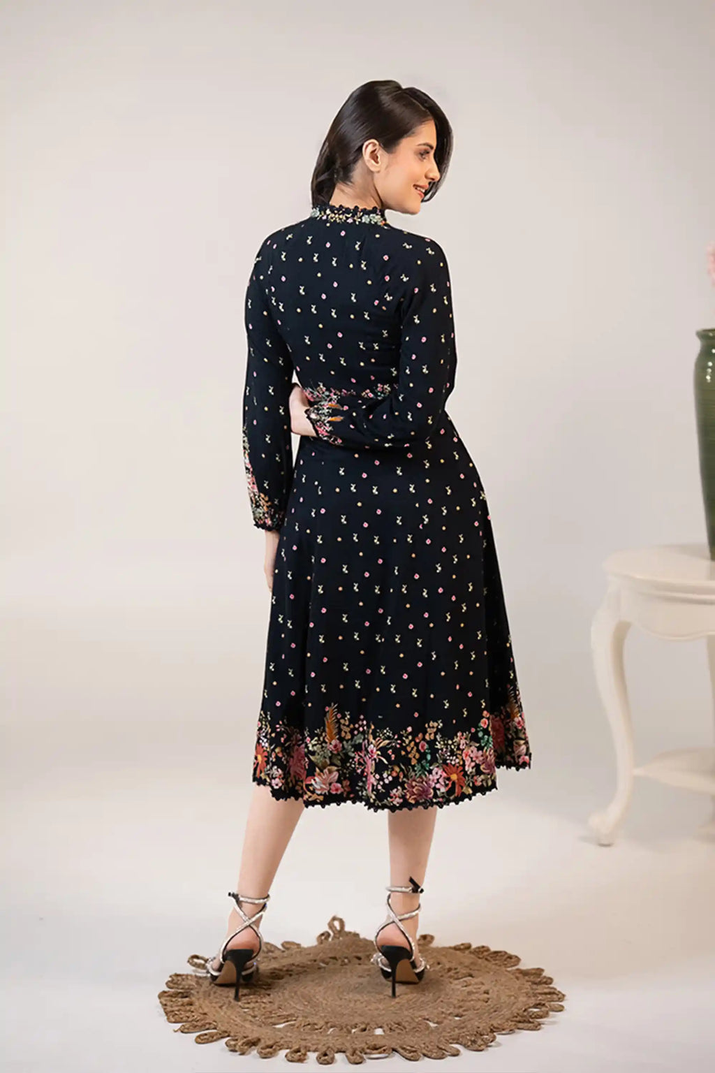 Black floral midi dress back view with long sleeves
