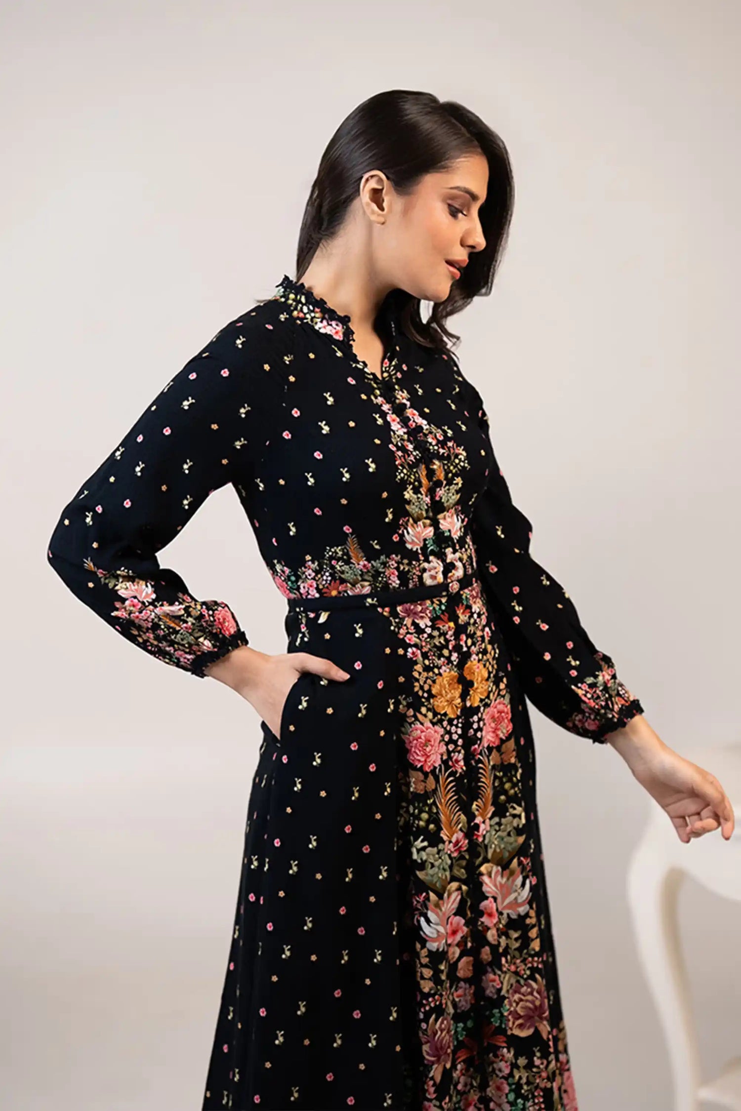 Elegant black floral midi dress side profile