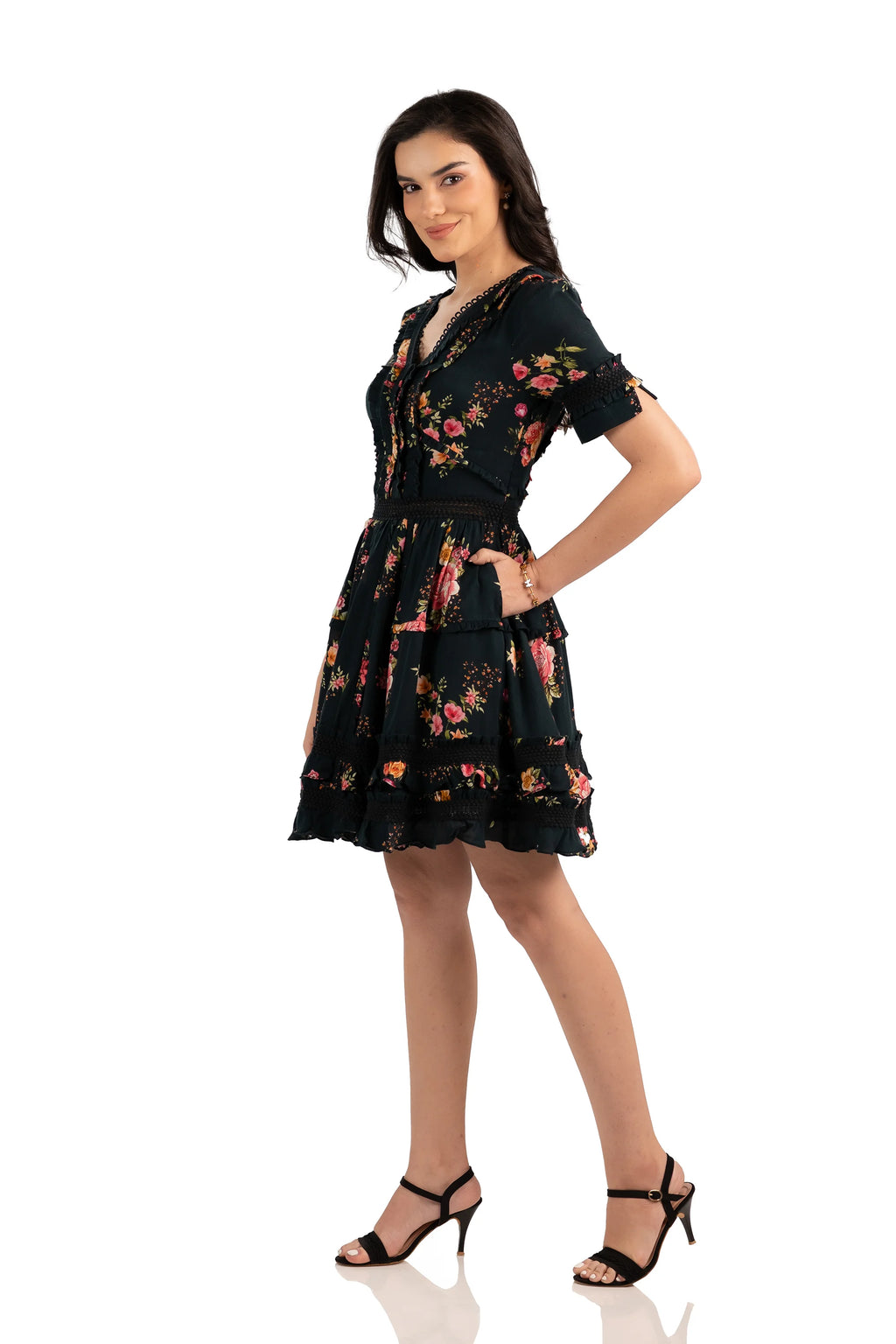 Elegant black floral short dress with layered ruffle skirt, short sleeves, and fitted waist