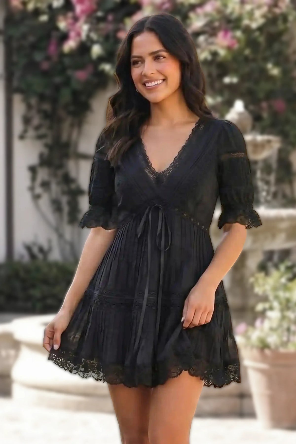 Pretty Pixie Black lace-trim pleated v-neck tiered mini dress for women, side view