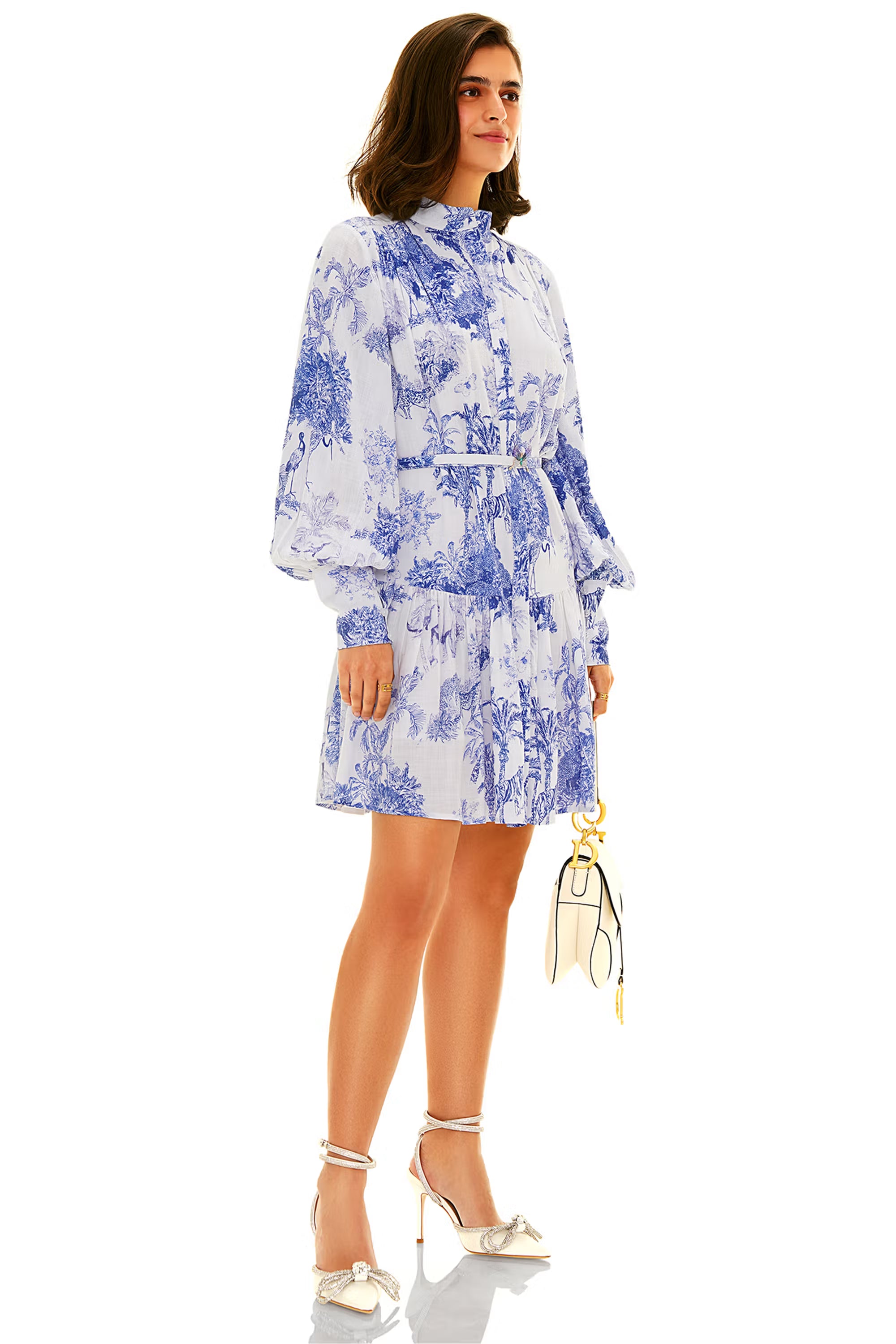 Side view of blue and white floral mini dress belted waist elegant style