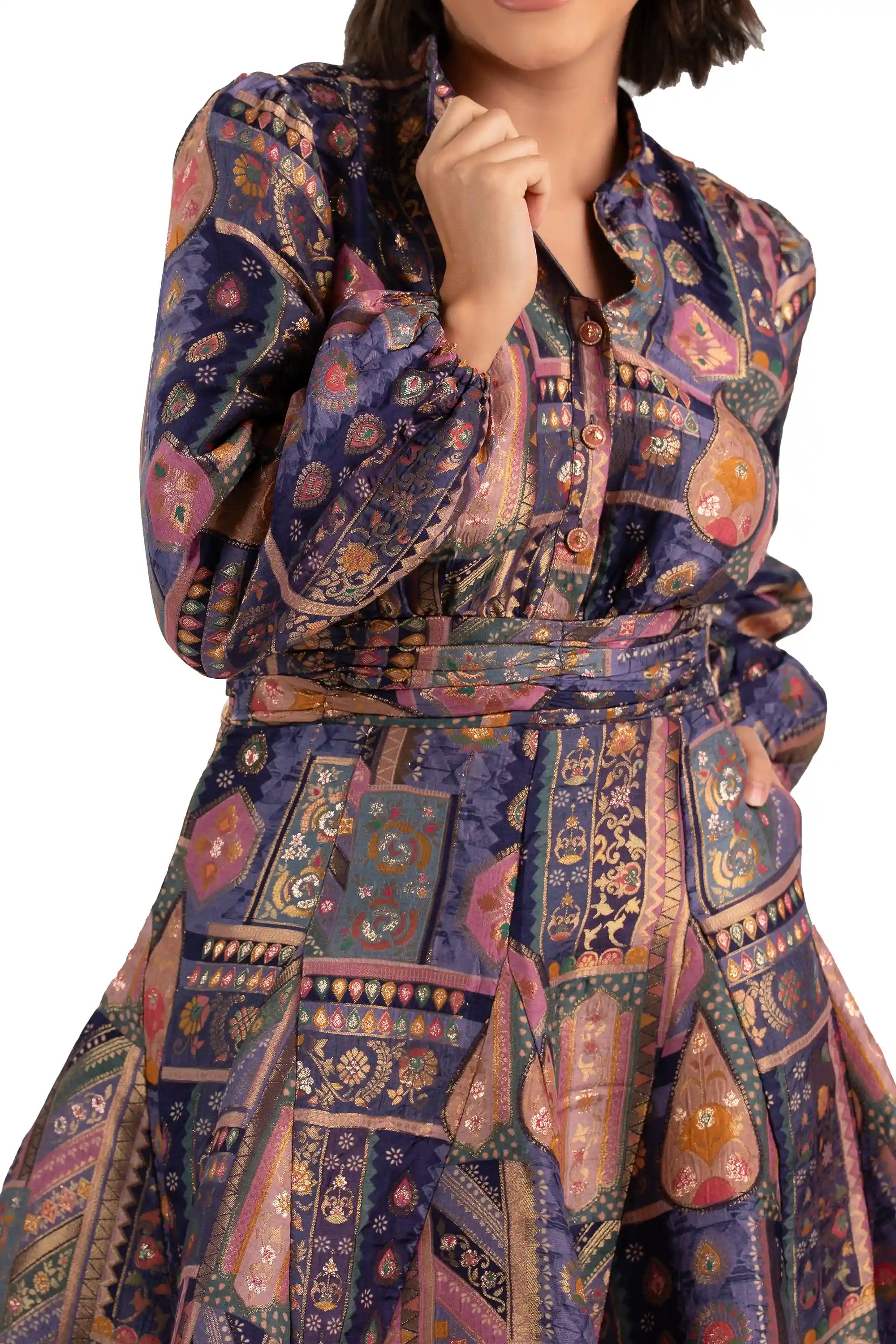 Close-up of belt and button placket on navy boho patchwork shimmer fabric dress