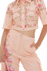 Close-up of Pretty Pixie Brooklyn blush pink cropped shirt & flare pants co-ord set