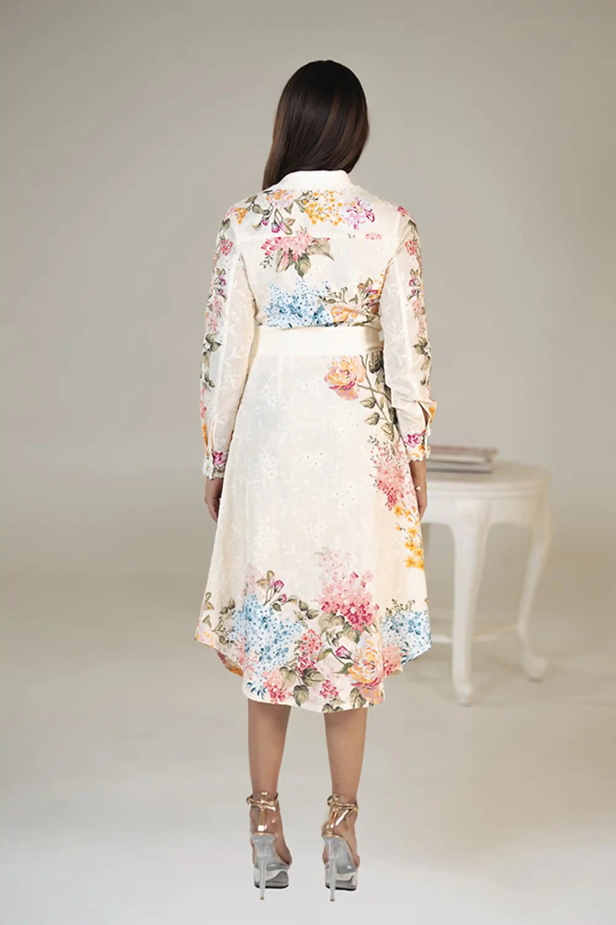 Back view of cream floral shirt dress with belt and colorful flower print