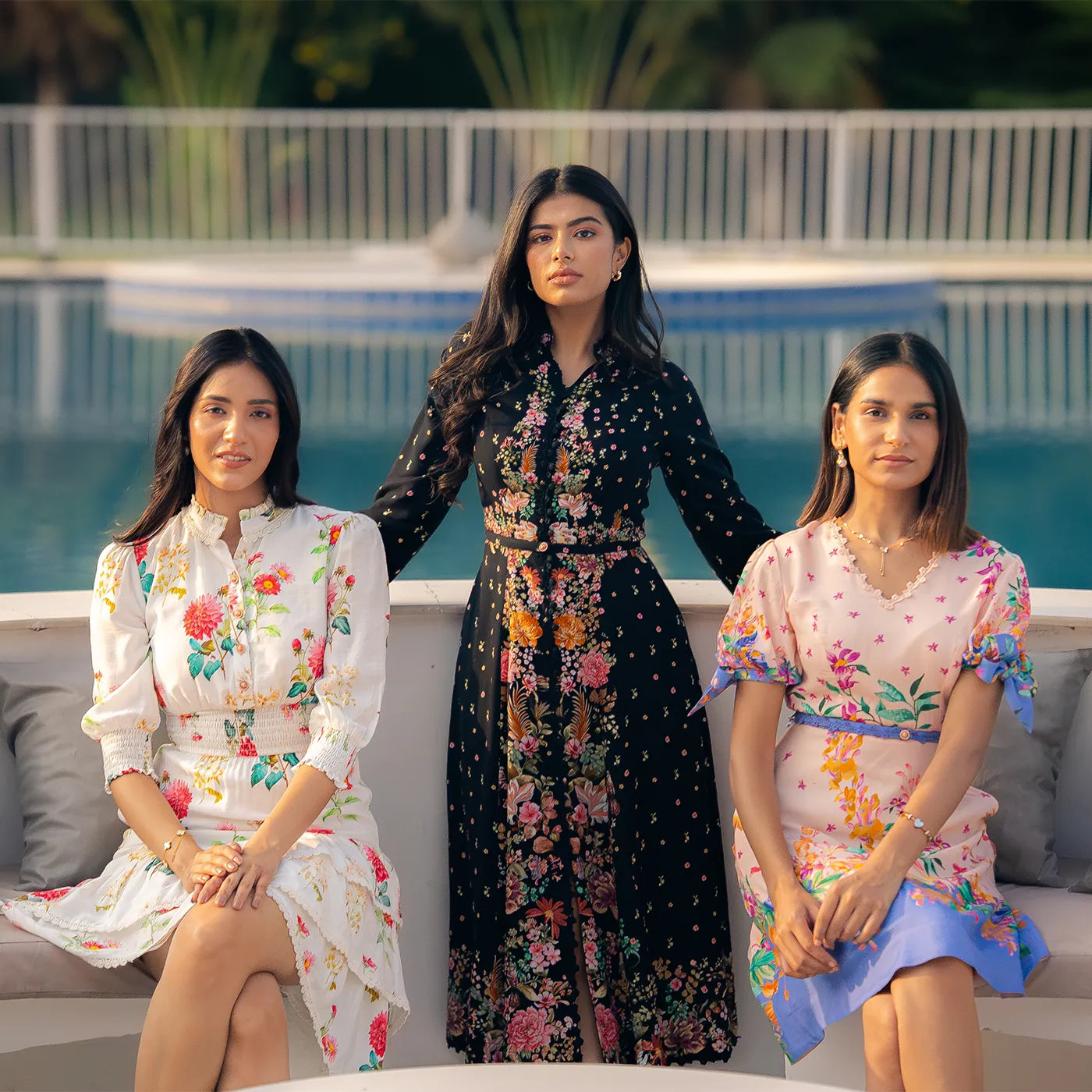 Indian women in floral midi and maxi dresses, luxury pool party fashion collection India 2025.