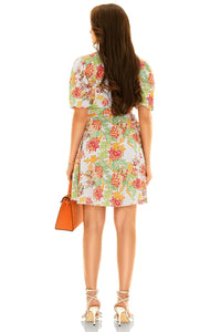 Back view of floral v-neck puff sleeve mini dress – chic summer dress for women