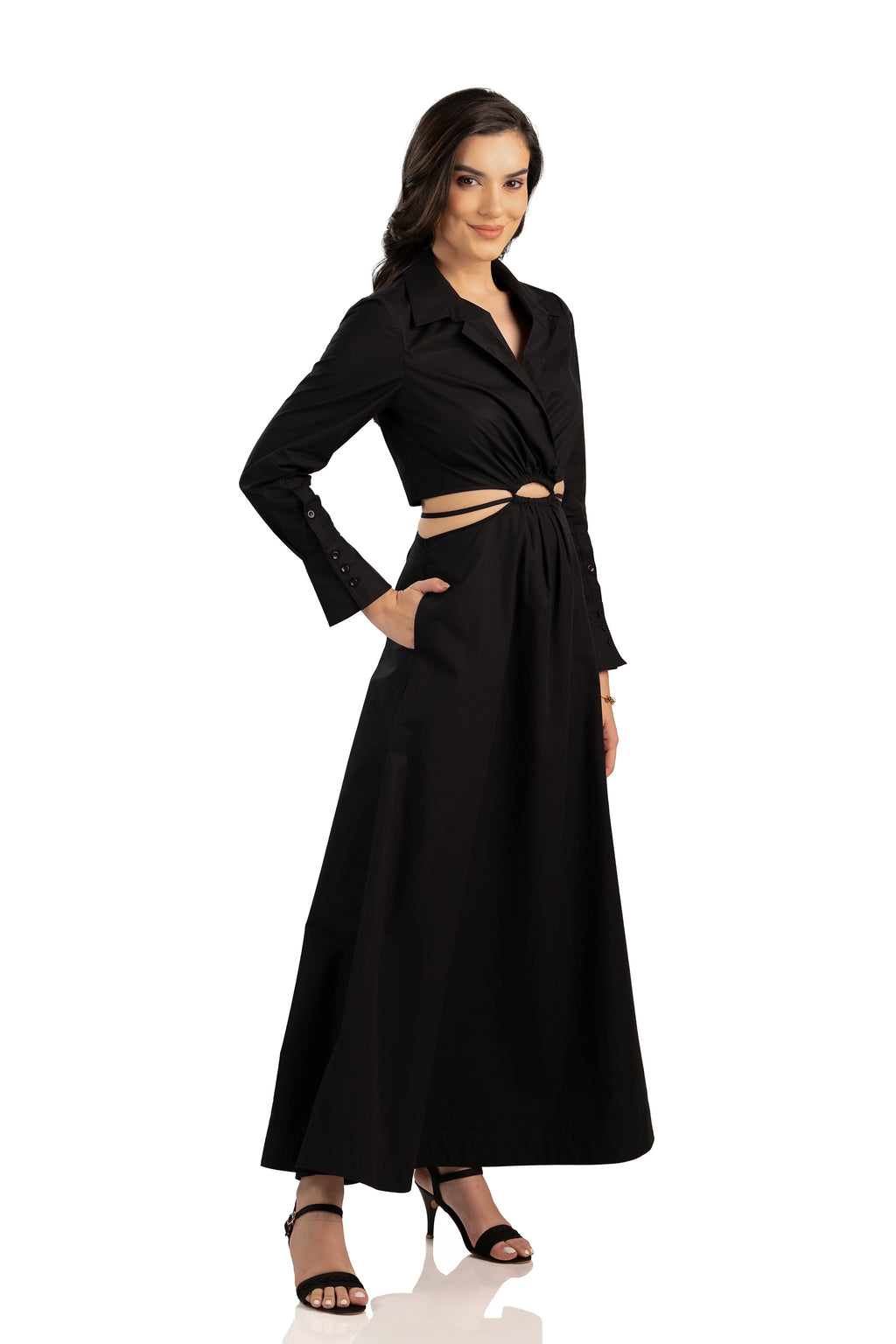 black maxi dress with cutout waist, long sleeves, and collared neckline.