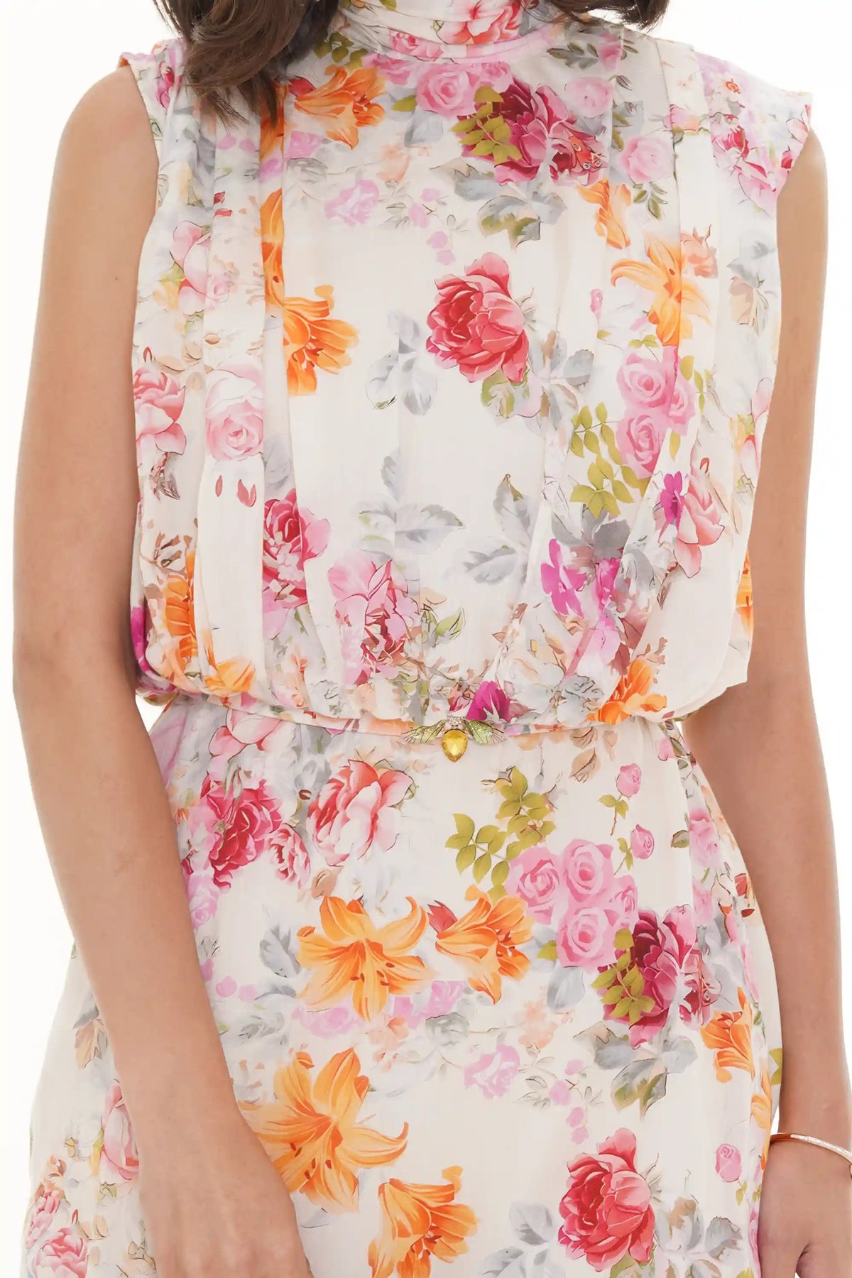 Close-up of Pretty Pixie ivory floral belted button-front mini dress, hem detail
