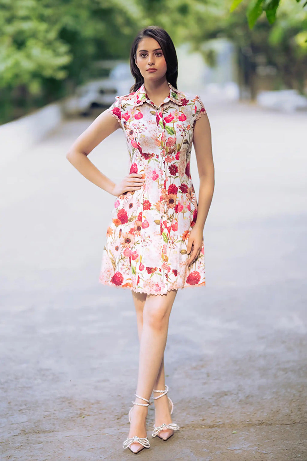 Full front view of ivory floral collared shirt dress with pink flowers