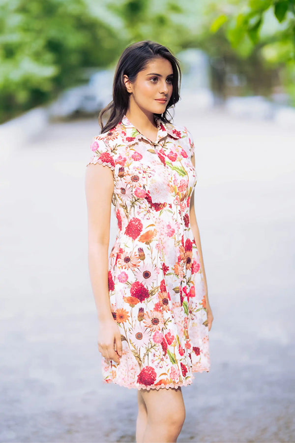 Side profile of ivory floral collared shirt dress with floral pattern
