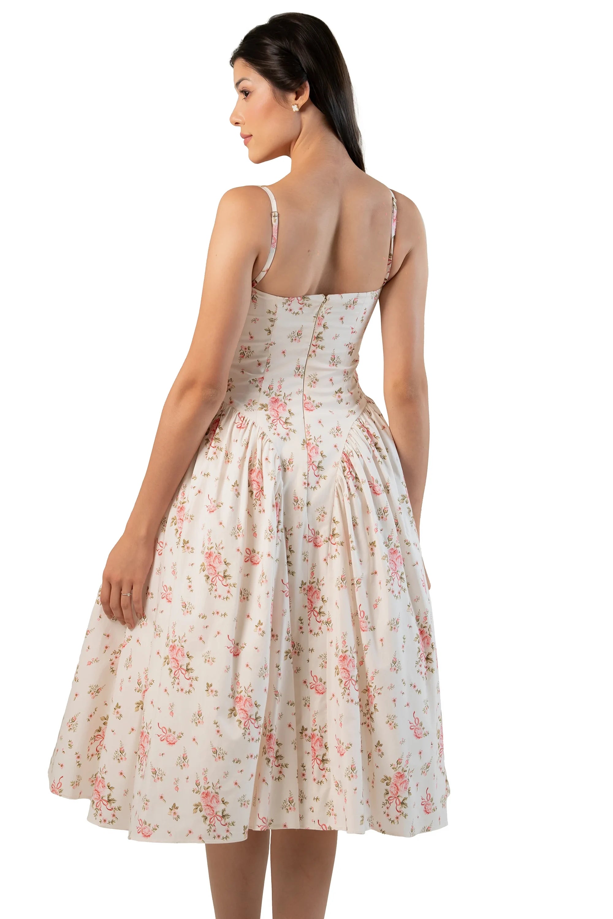 Back view of ivory floral cotton midi dress on model