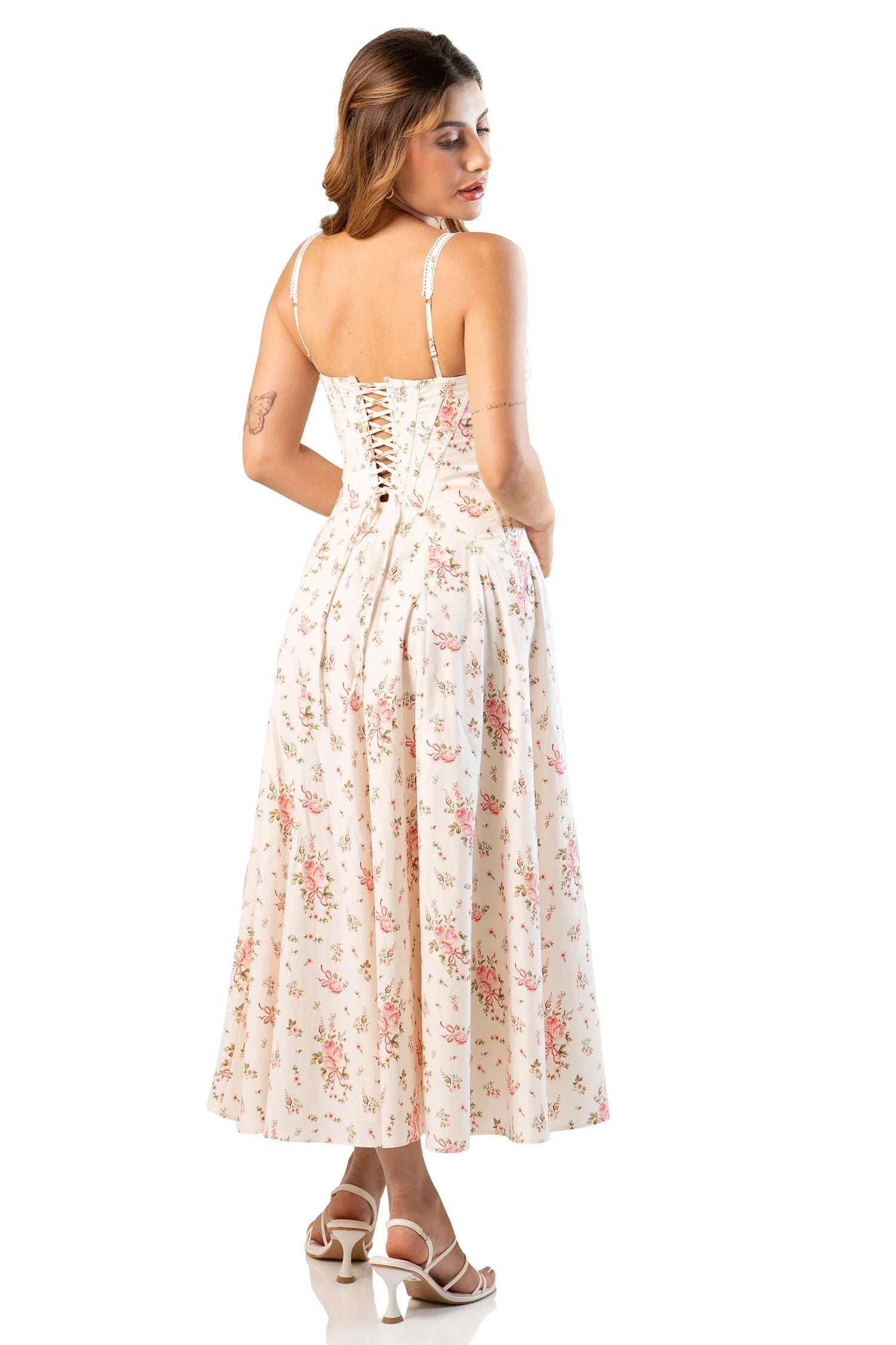 Back view showing lace-up corset of ivory floral midi dress