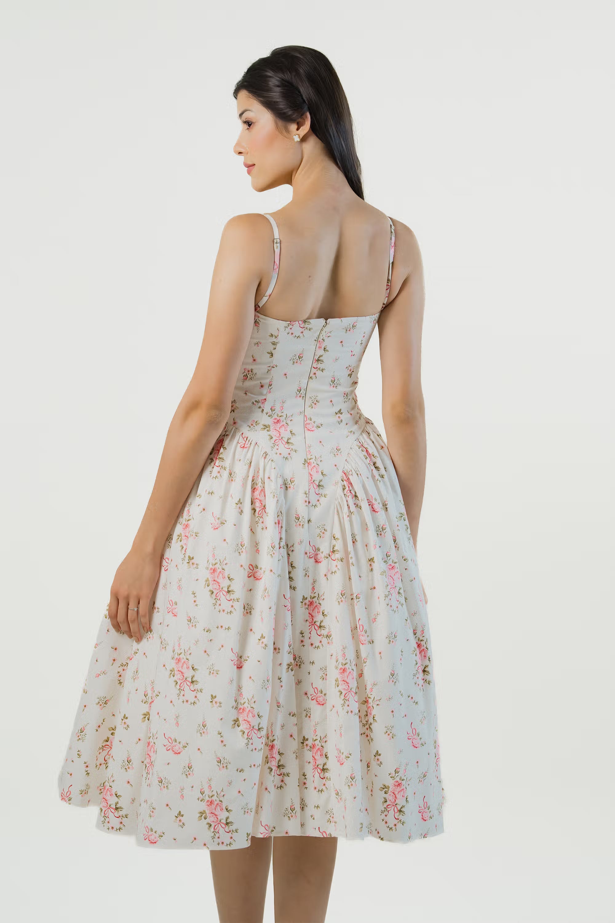 Ivory floral midi dress, back view, flared skirt, pink flowers.
