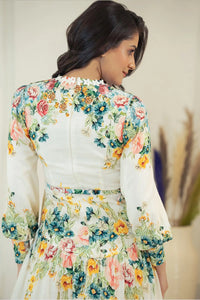Back closeup of ivory floral mini dress showing floral print details