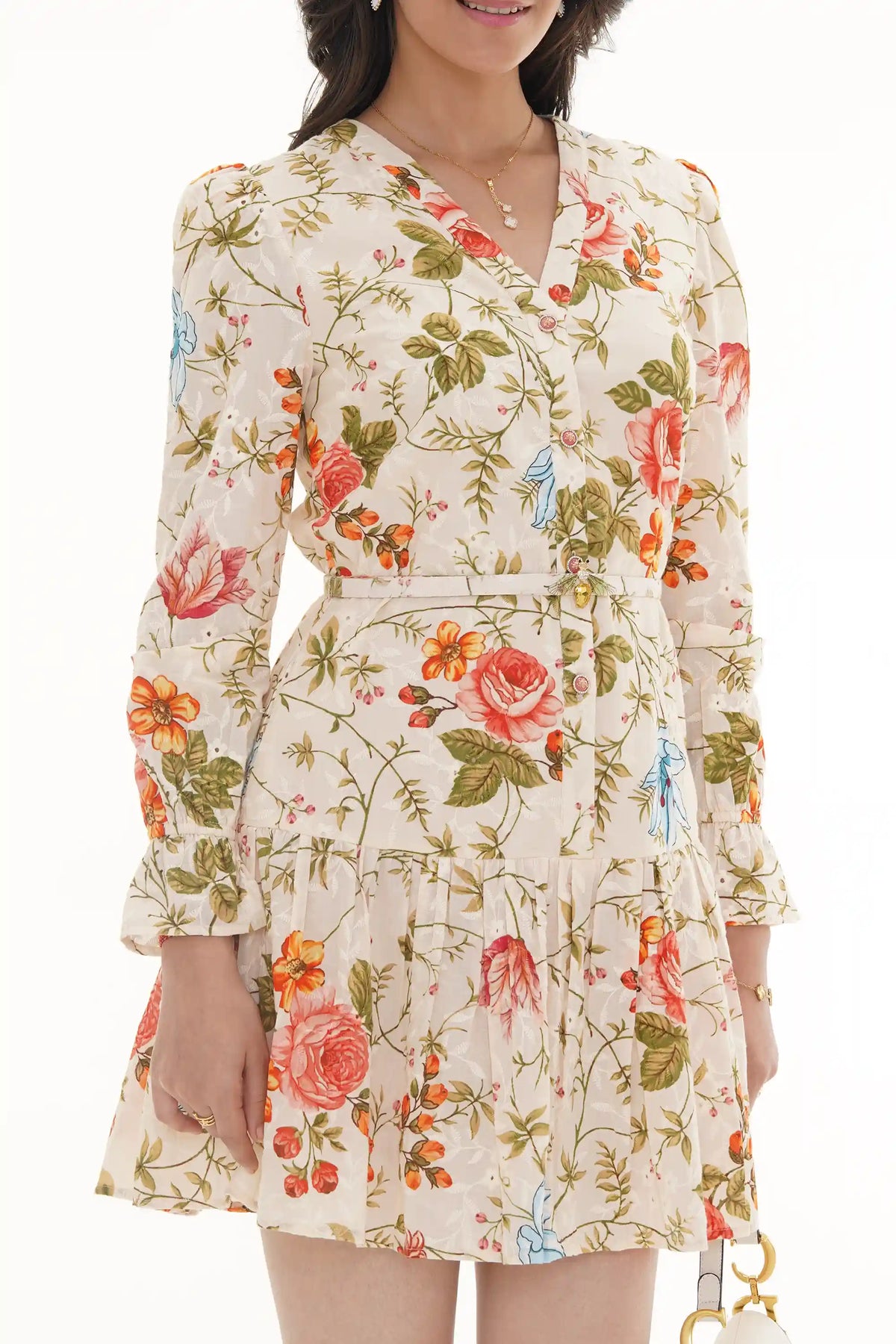 Close-up of Pretty Pixie ivory floral wrap long-sleeve mini dress