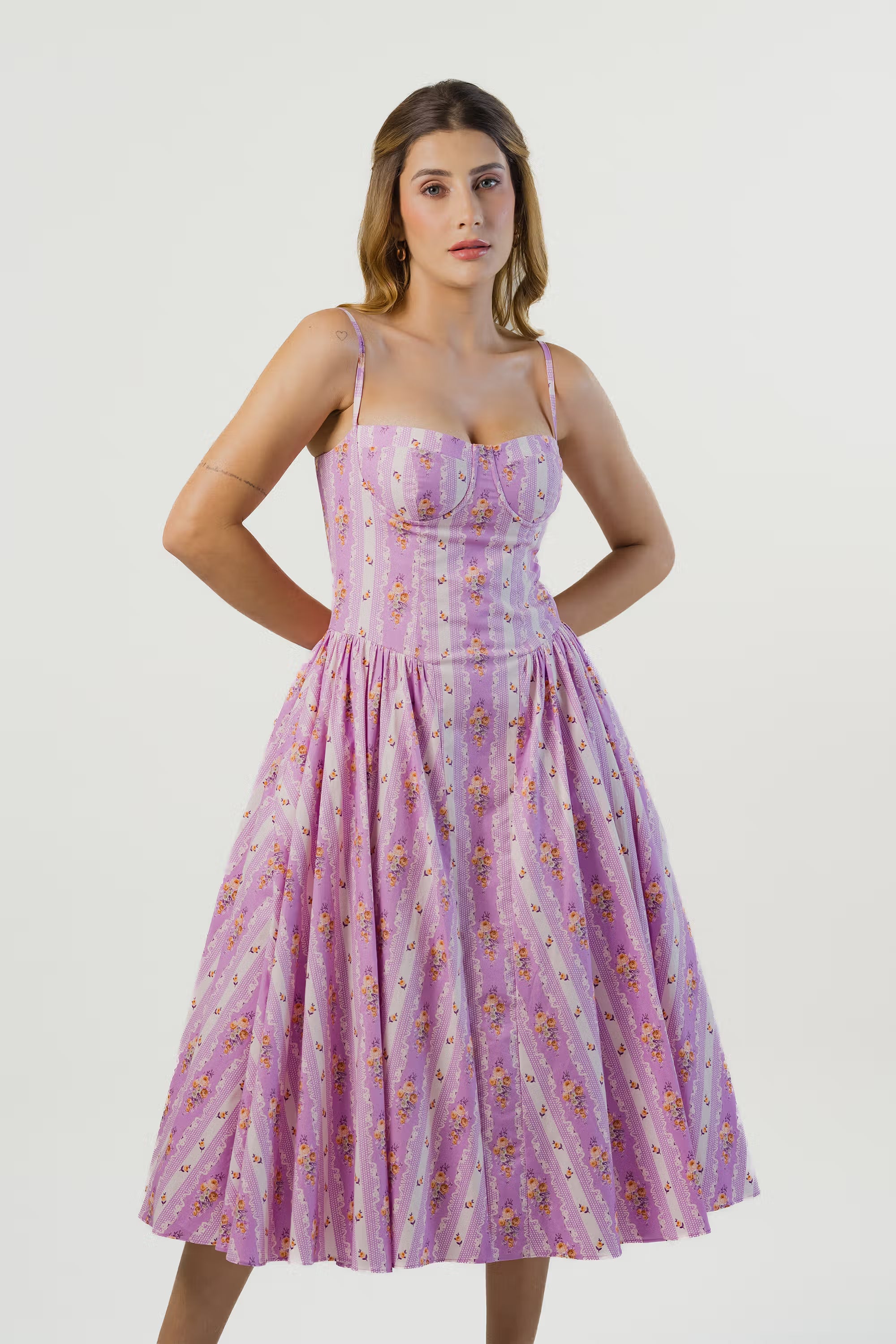 Front pose of lavender corset midi dress with pink floral stripe pattern