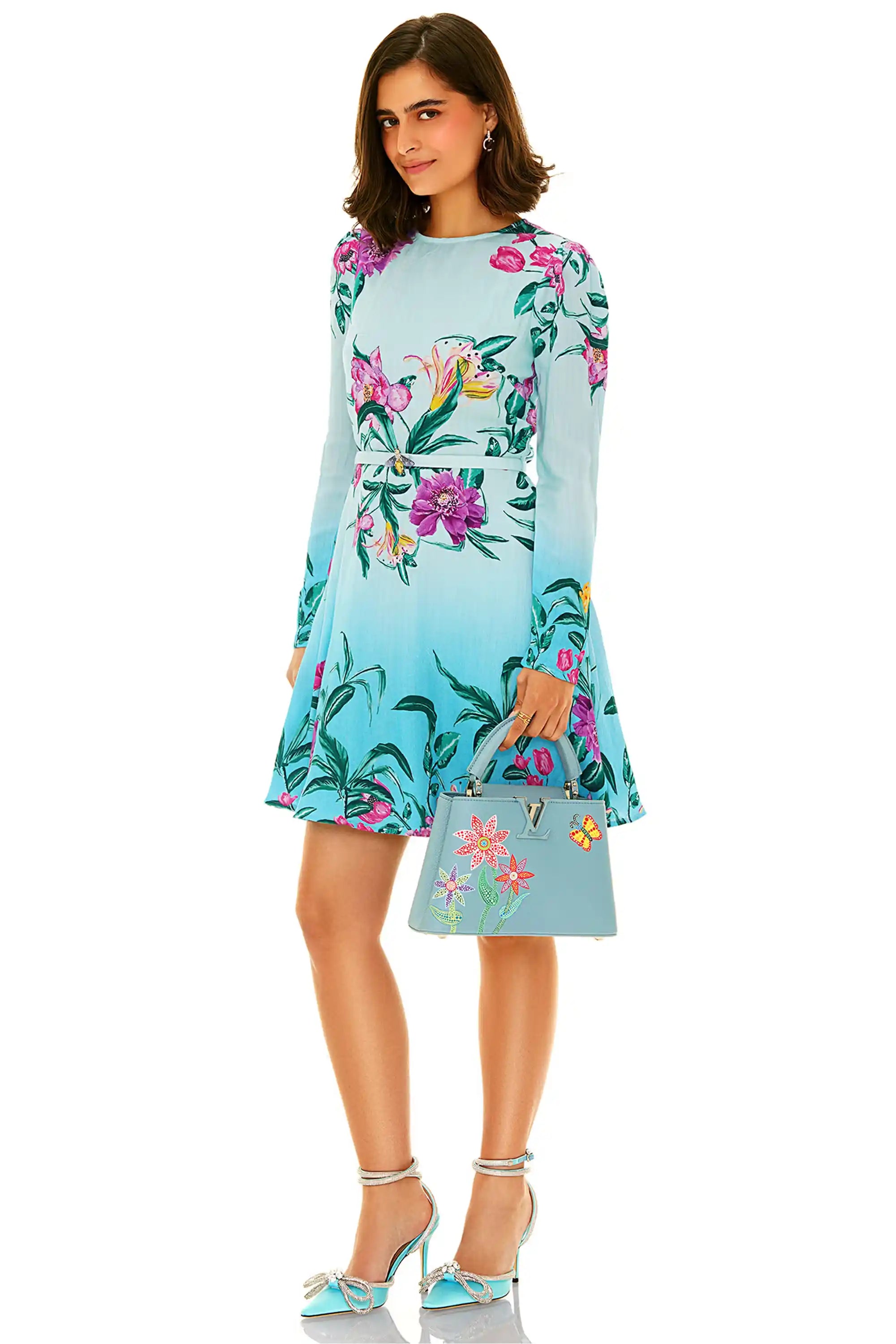 Light blue floral mini dress with purple flower print and fitted waist – side view