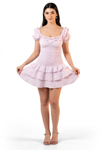 Front view of women’s lilac eyelet smocked mini dress with ruffle neckline, puff sleeves and tiered flounce skirt — fit-and-flare