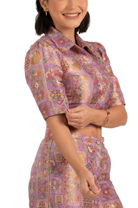 Close-up of sleeve, collar and buttons on lilac jacquard crop shirt co-ord