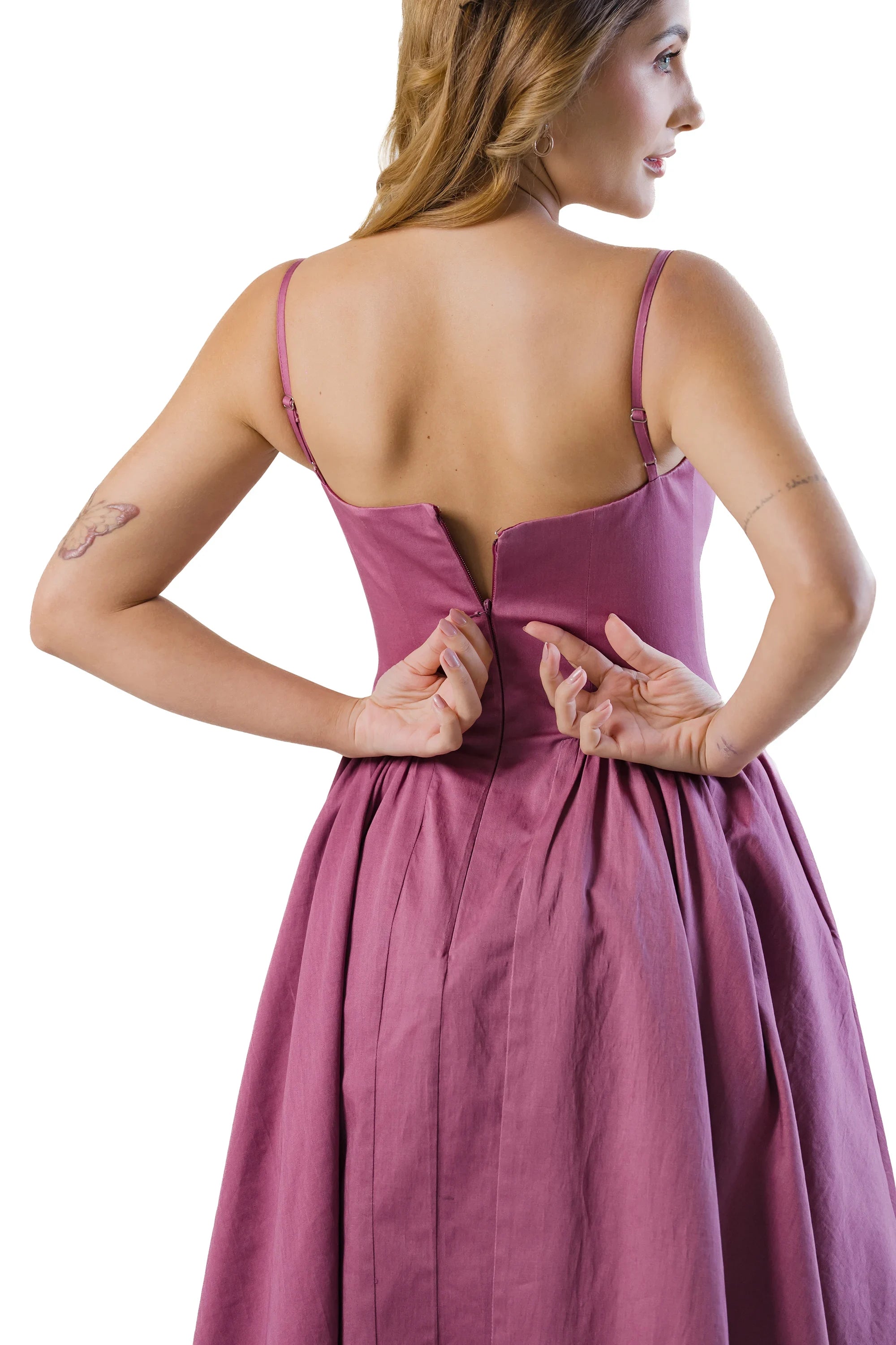 Close-up of back zipper and adjustable straps on mauve cotton midi dress with fitted bodice and gathered waist