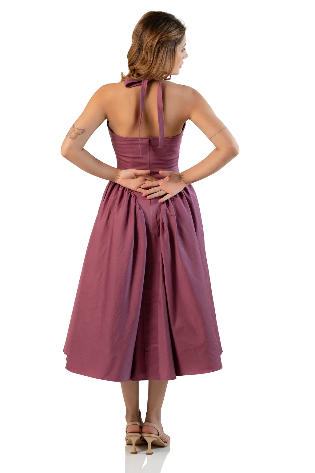Back view: mauve halter midi dress with flared skirt