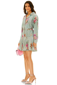 Back view of mint floral collared belted mini dress