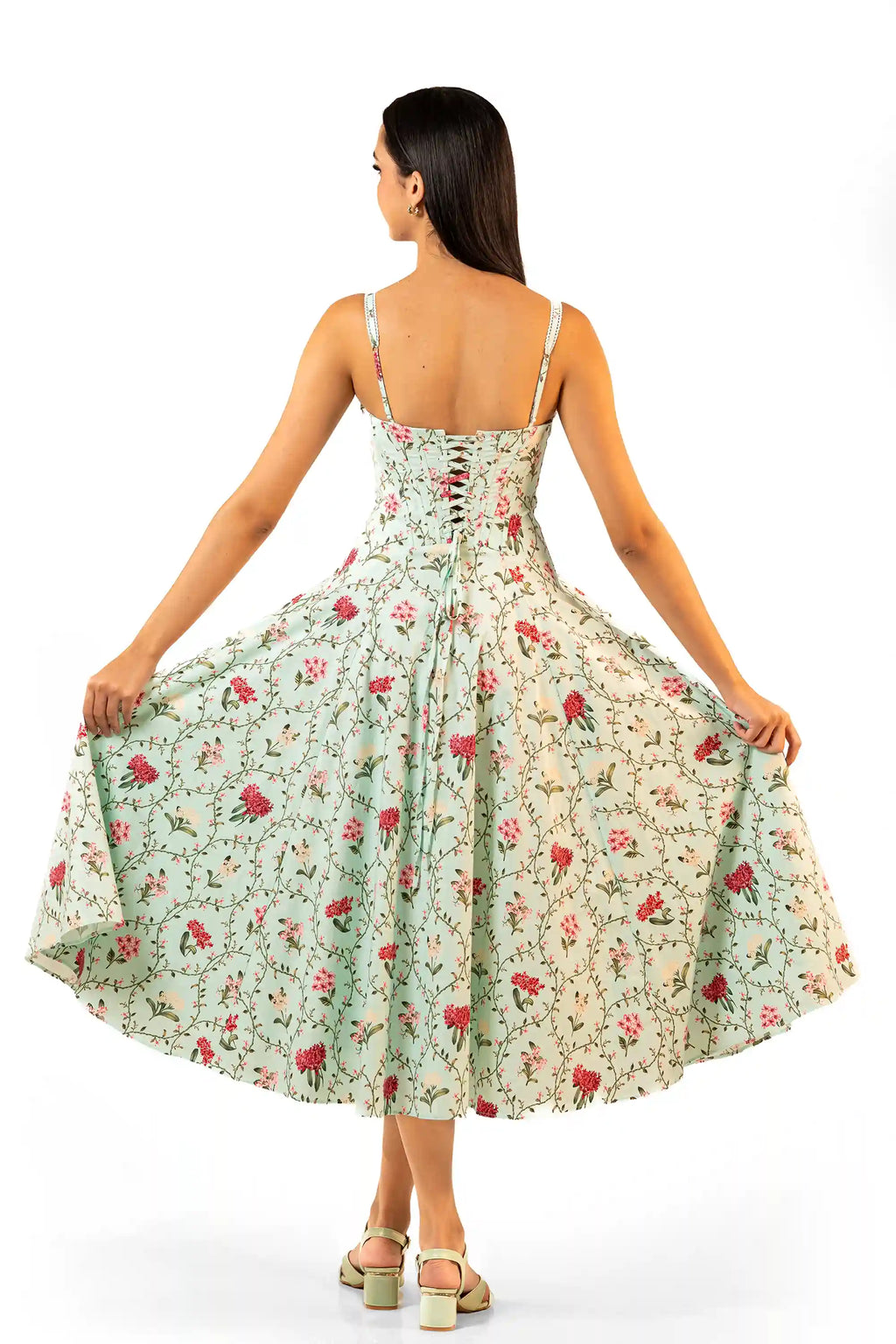 Back view of mint green floral midi dress with corset lace-up bodice and flared skirt