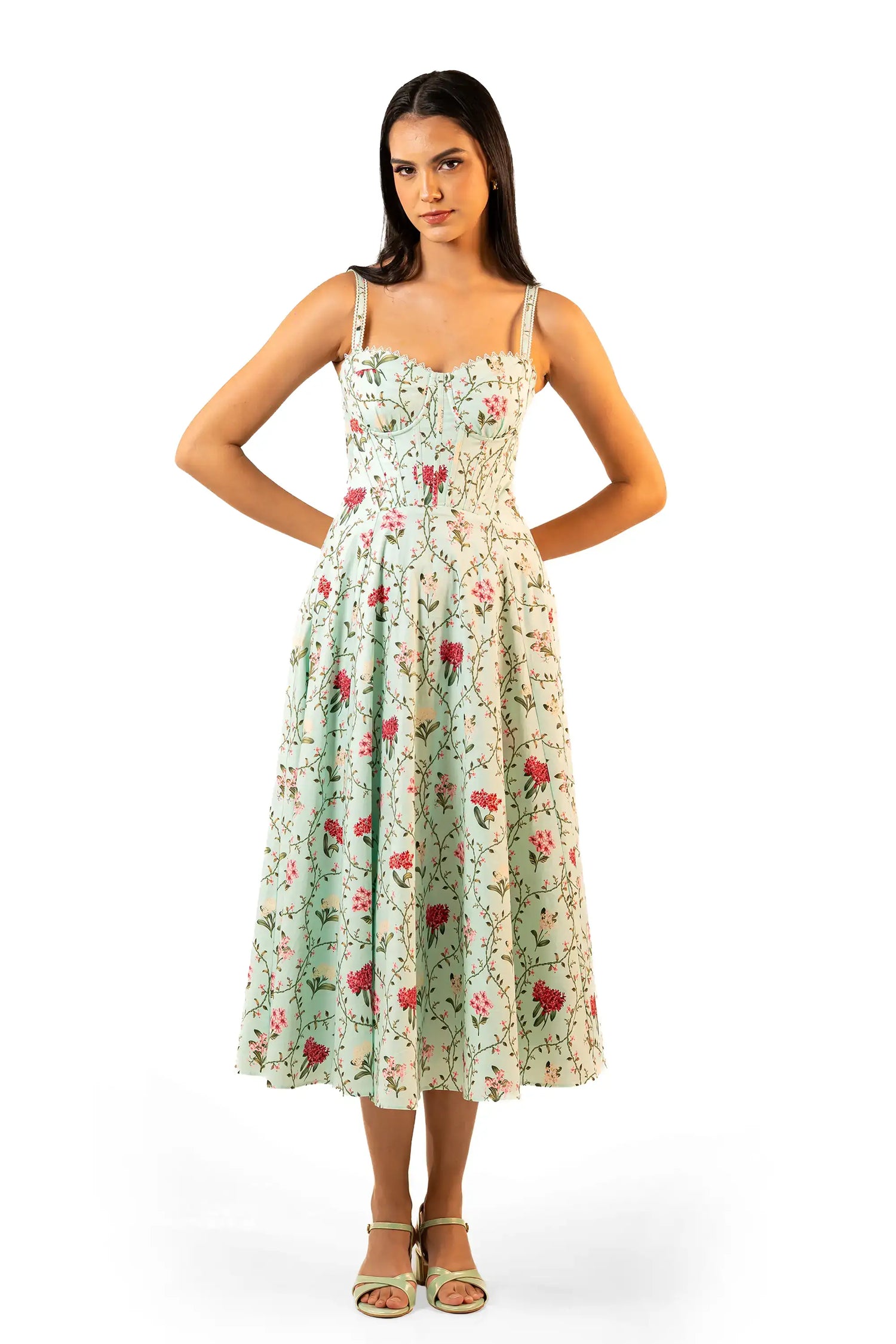 Full-length front view: mint green floral bustier midi dress with sweetheart neckline and flared skirt