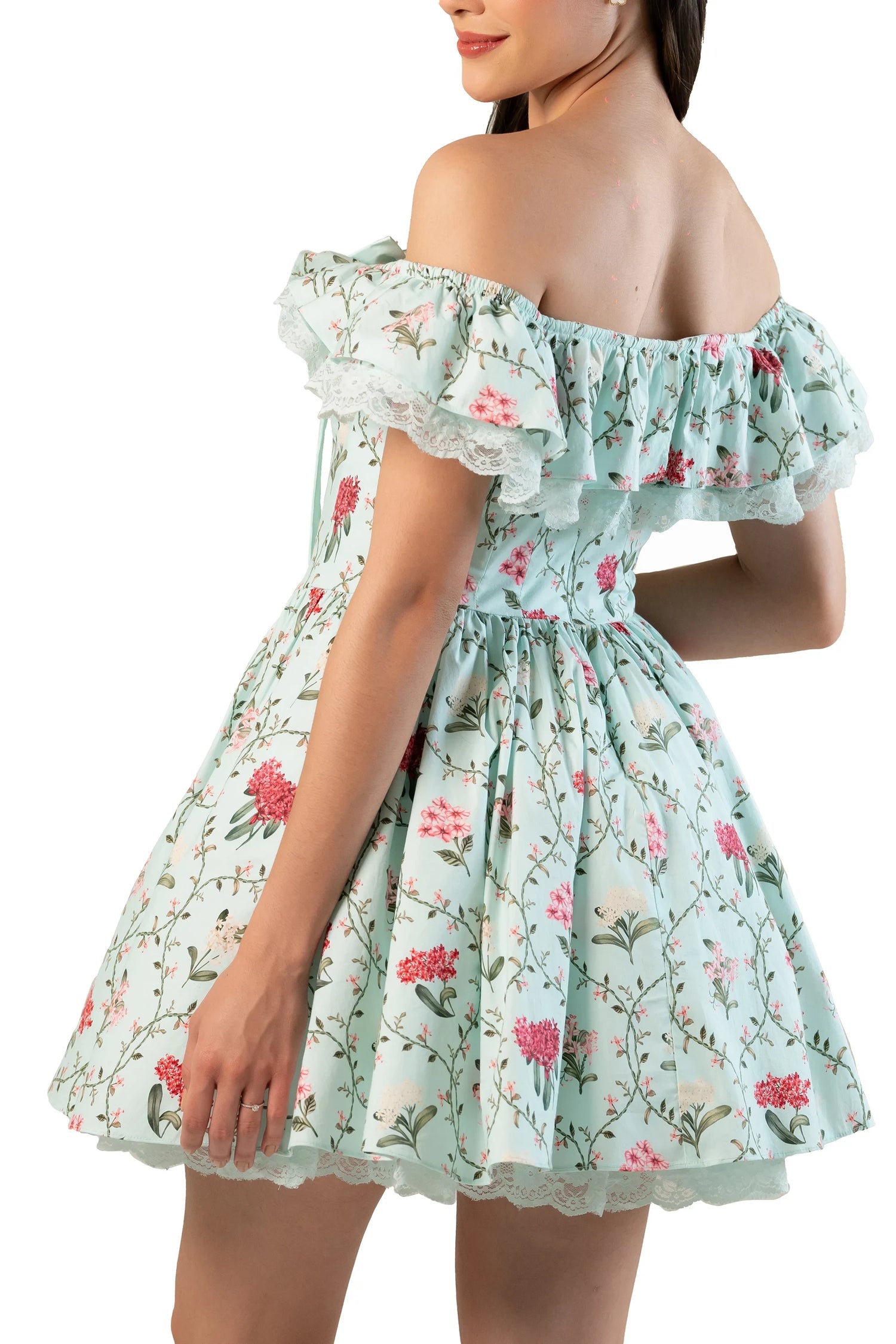 Back view: mint floral off-shoulder mini dress with ruffle neckline, lace hem