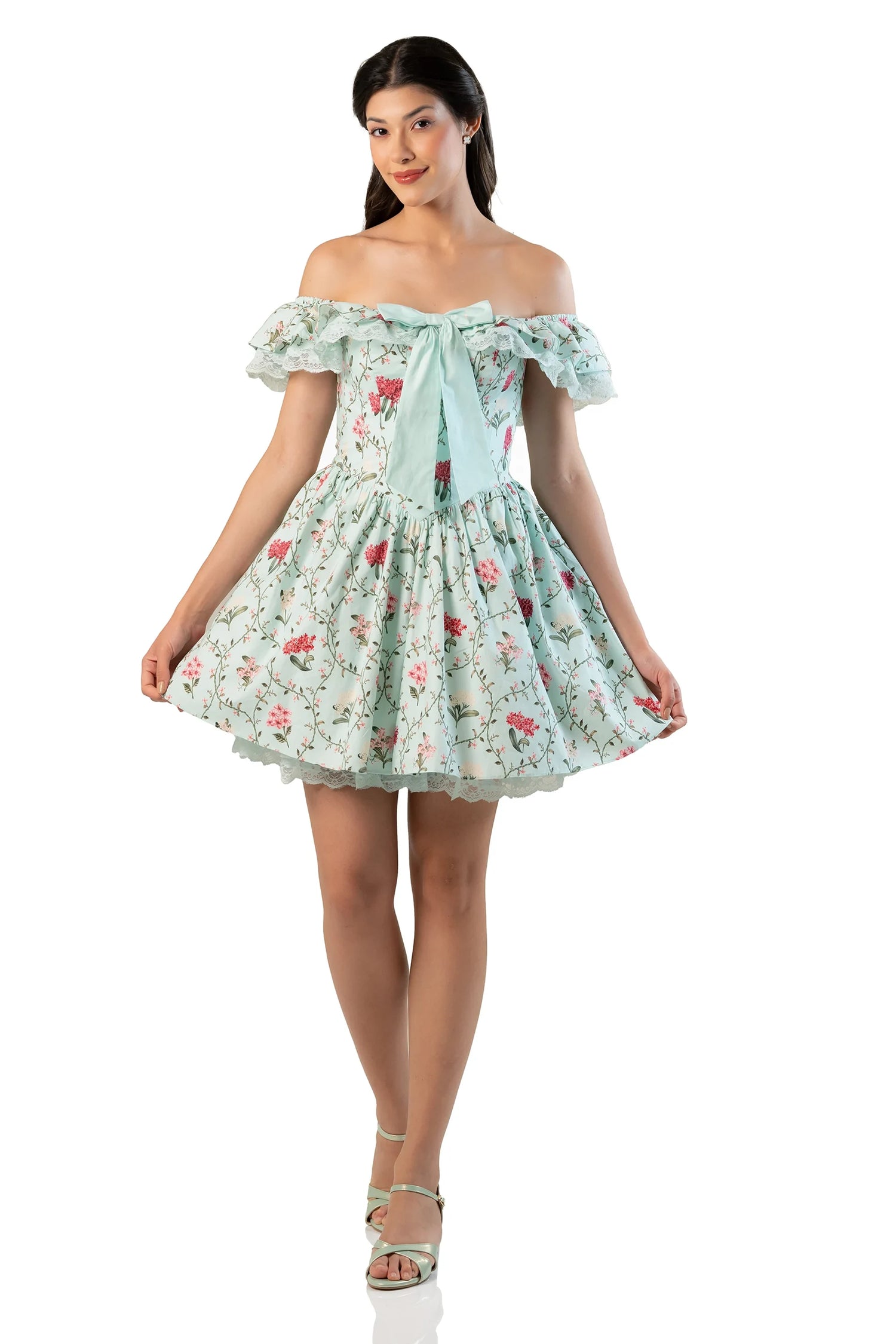Skirt lift: mint floral mini revealing tulle petticoat and scalloped lace hem
