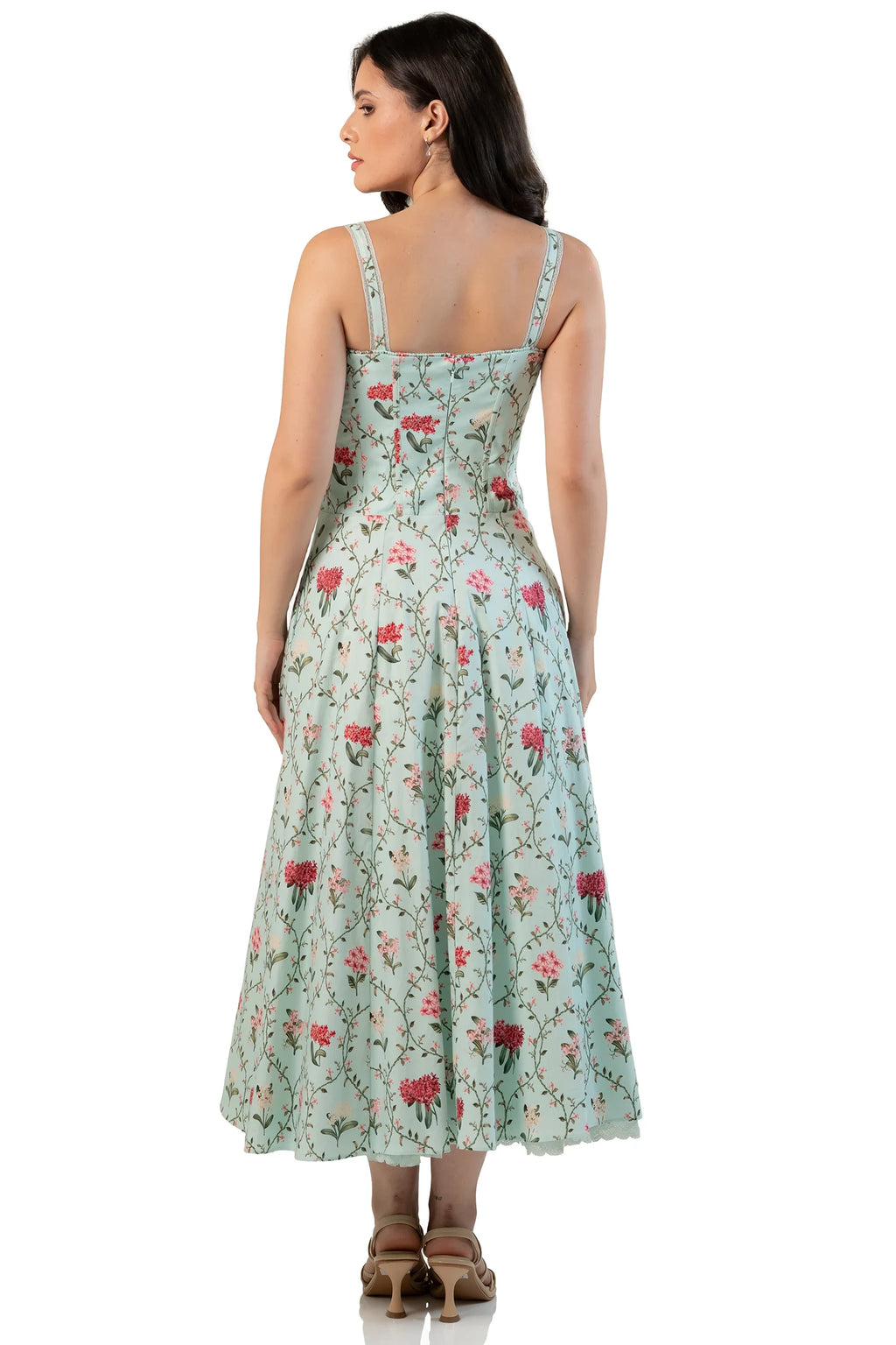 Back view of mint floral ruched midi dress on model