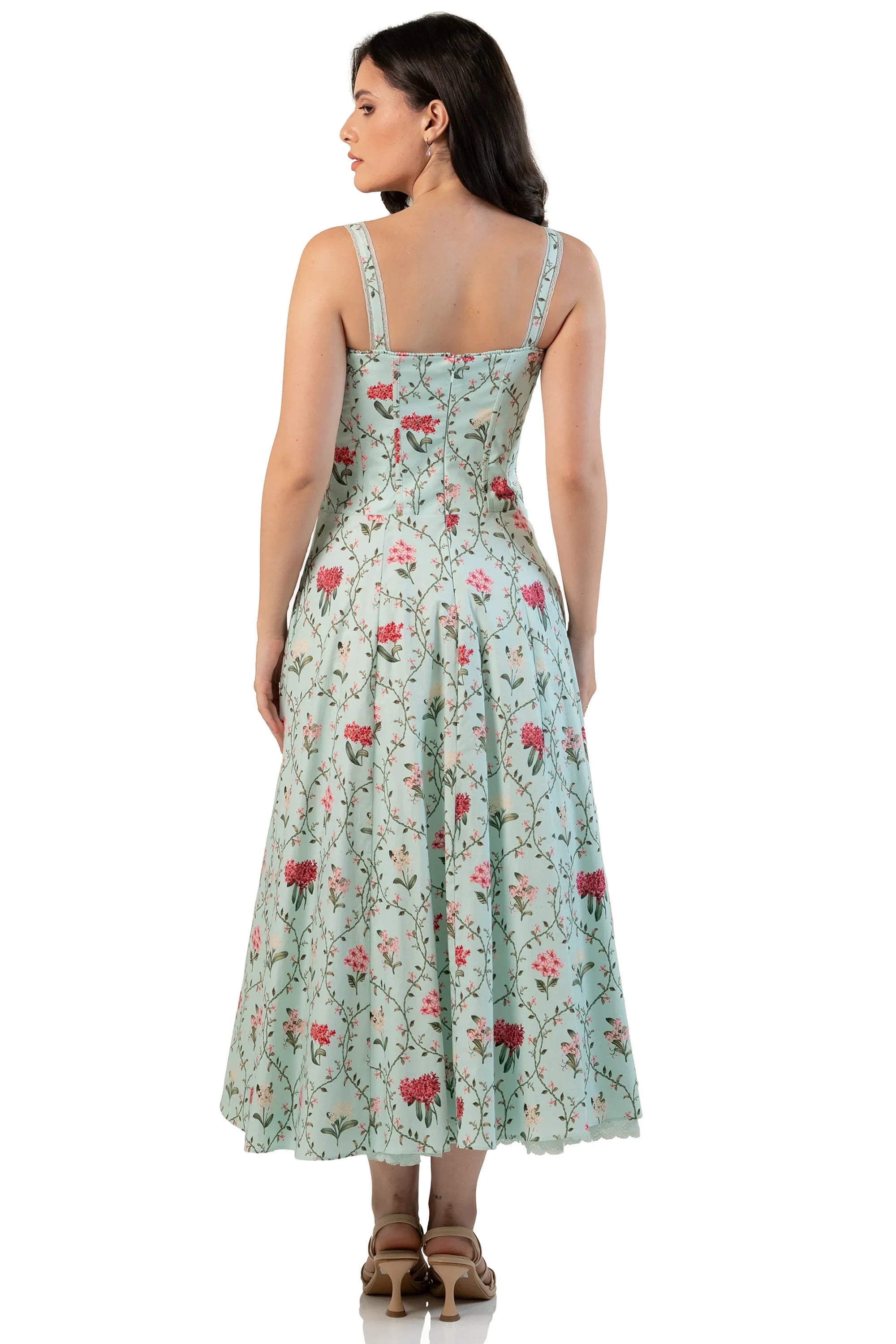 Back view of mint floral ruched midi dress on model