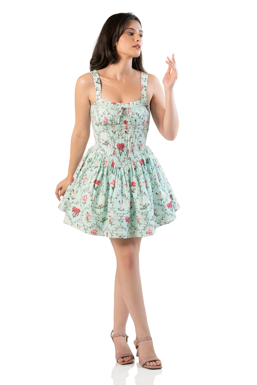 Front view, hand raised: mint floral smocked mini dress